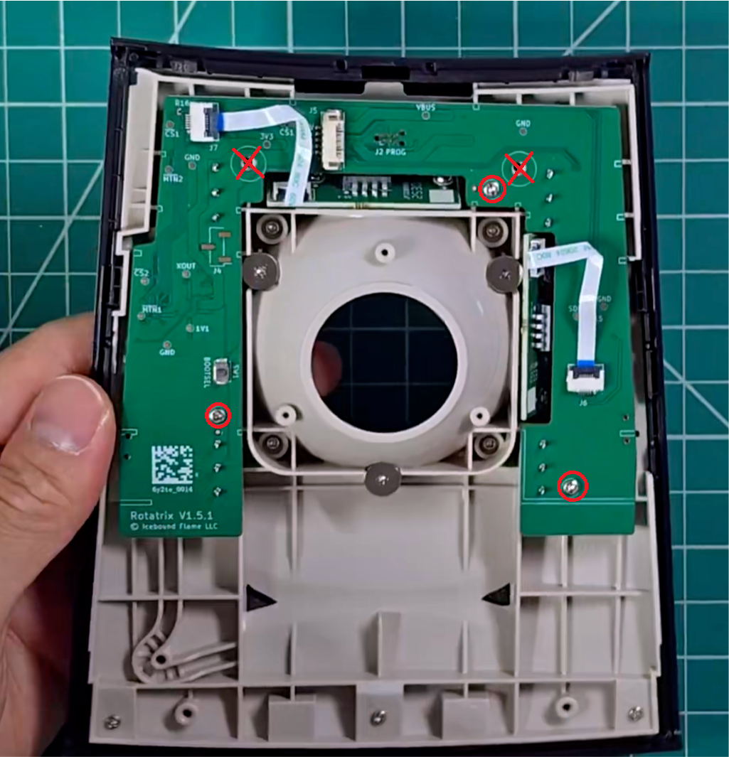 The Rotatrix board installed in the SlimBlade Pro case, seated around the ball socket with the ribbon cables connected