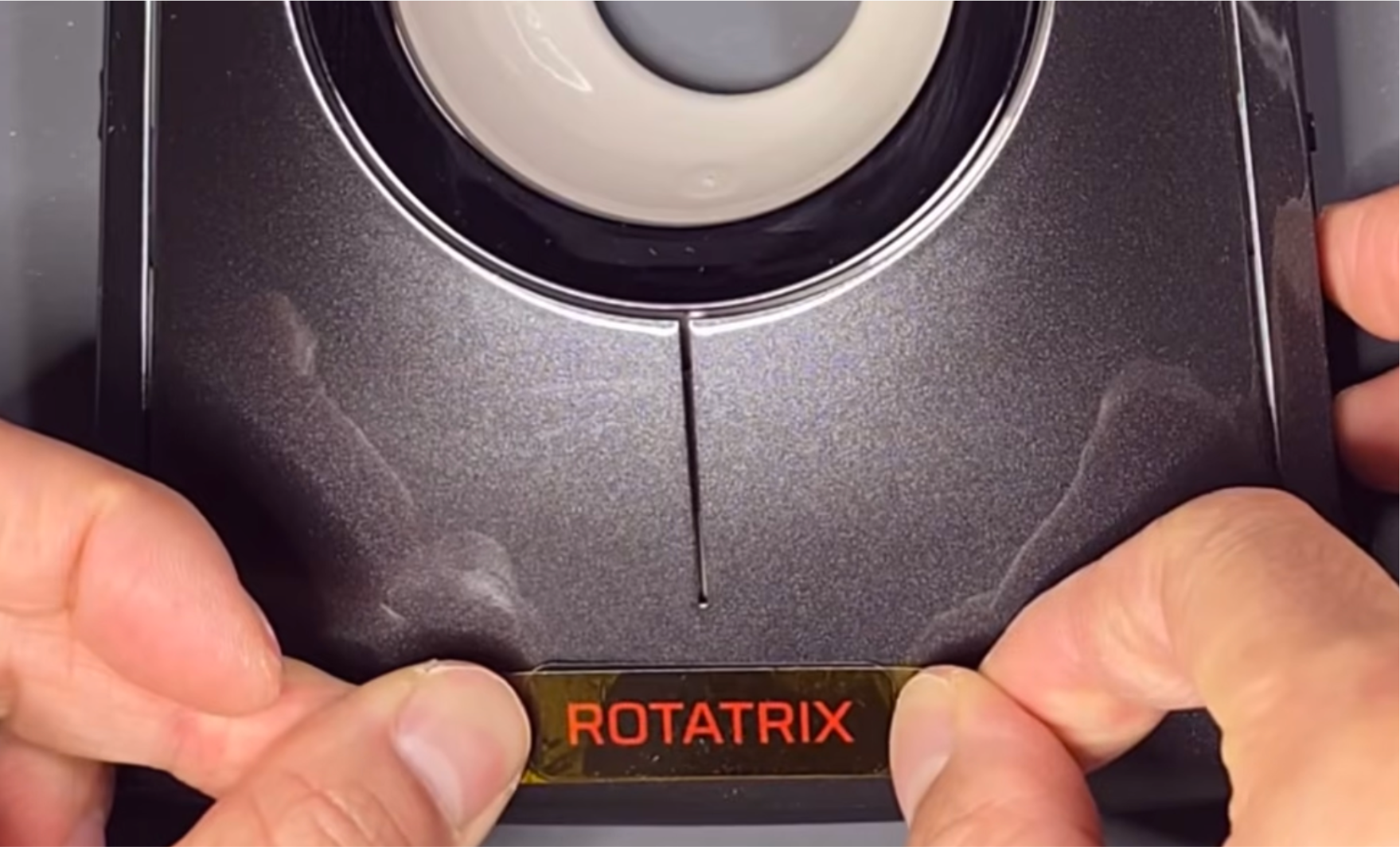 The Rotatrix decal applied to the palm rest over the Kensington logo